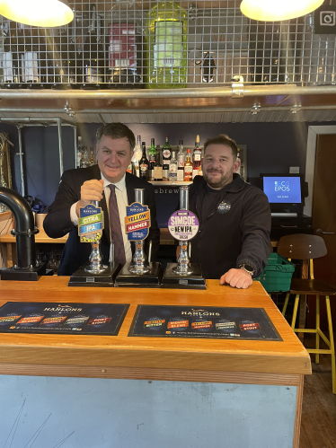 Picture caption: Mel Stride, MP for Central Devon and Secretary of State for Work and Pensions with Dan Taylor from Hanlon’s Brewery